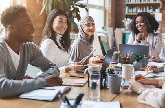 lose up of young multiracial team having meeting in office