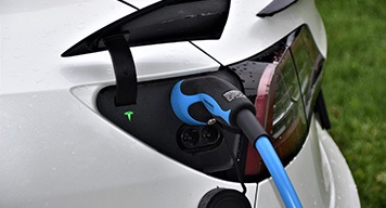 ev-car-is-charging-with-blue-color-ev-charger