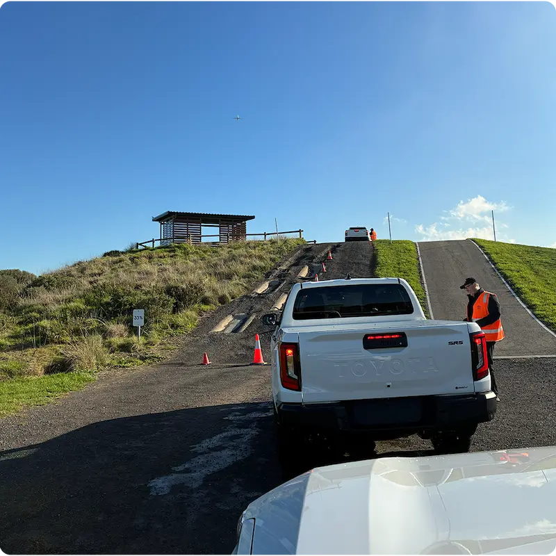 Pickup trucks testing on off-road hill course