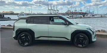 Kia EV3 car in Matcha Green parked in Williamstown VIC by the water.