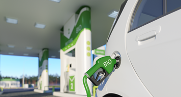 Biofuel refuelling the car on the filling station forecourt