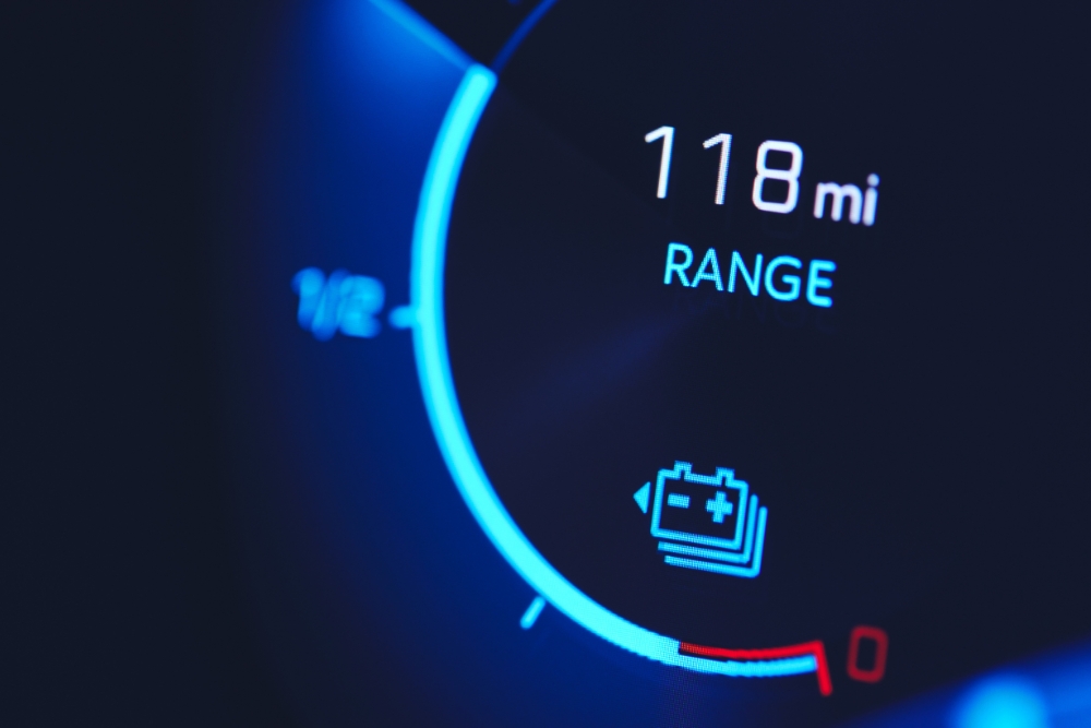 Real-world EV range: A close-up digital dashboard display showing an electric vehicle’s remaining range at 118 miles.